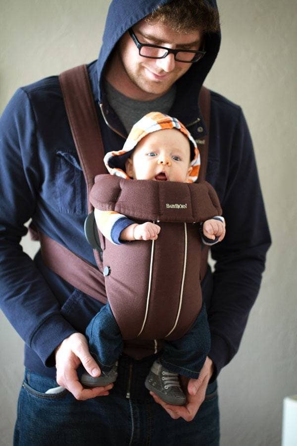 Man holding a baby.