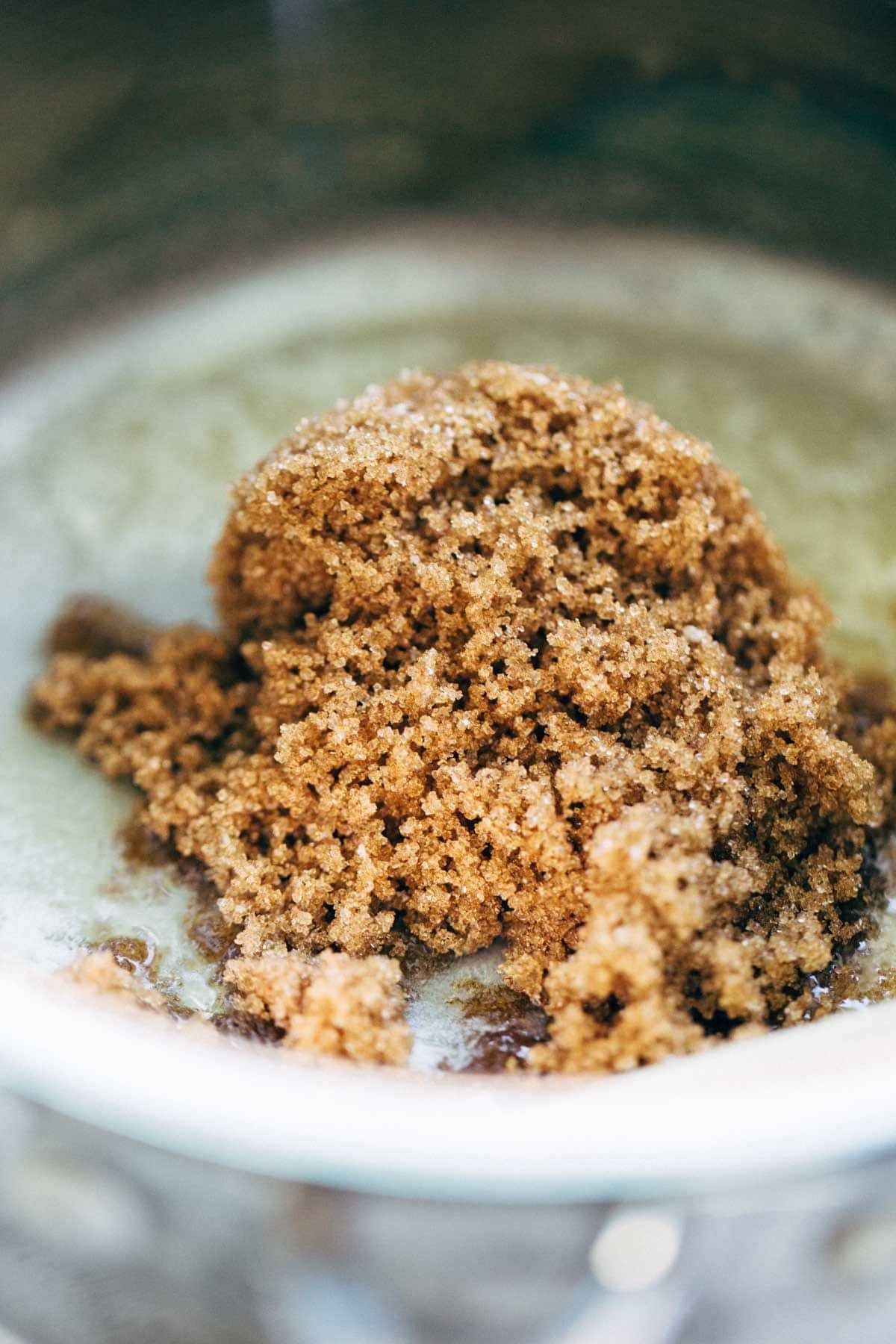 These layered bars are so simple! Loaded with homemade caramel and apples. Caramely apple layer tucked in by a brown sugar-y crust on both sides. | pinchofyum.com