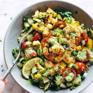 Glowing Grilled Summer Detox Salad in a bowl with a fork.