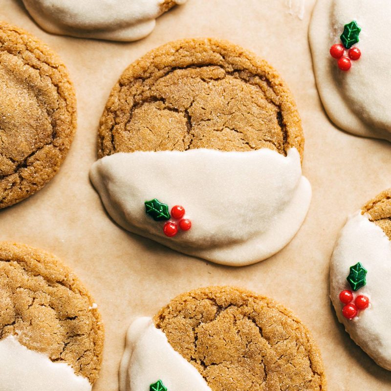 Gingerbread cookies with icing and holly sprinkles
